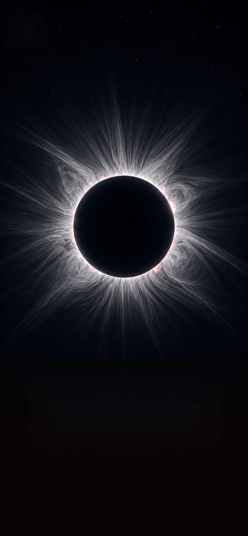 Eclipsi total amb filaments coronals visibles